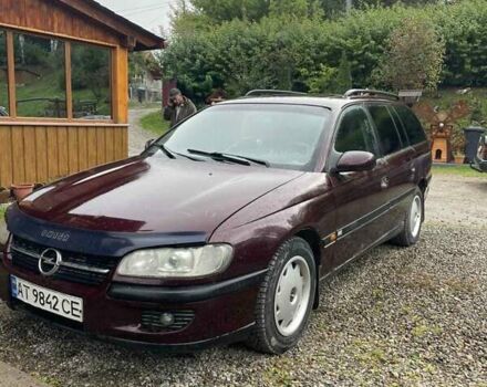 Красный Опель Омега, объемом двигателя 2 л и пробегом 250 тыс. км за 1100 $, фото 5 на Automoto.ua