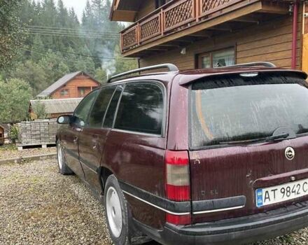Красный Опель Омега, объемом двигателя 2 л и пробегом 250 тыс. км за 1200 $, фото 5 на Automoto.ua