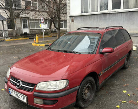 Червоний Опель Омега, об'ємом двигуна 2 л та пробігом 401 тис. км за 950 $, фото 2 на Automoto.ua