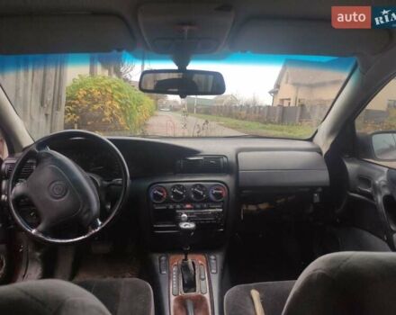 Красный Опель Омега, объемом двигателя 2 л и пробегом 300 тыс. км за 1800 $, фото 5 на Automoto.ua