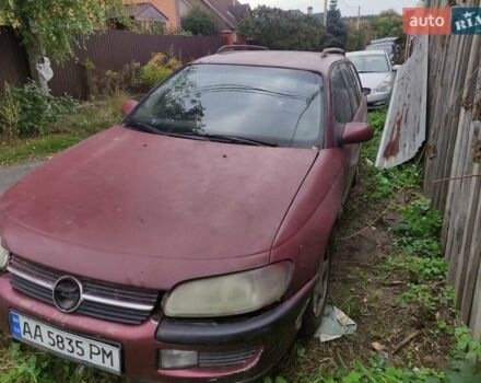 Красный Опель Омега, объемом двигателя 2 л и пробегом 300 тыс. км за 1800 $, фото 2 на Automoto.ua