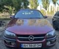 Червоний Опель Омега, об'ємом двигуна 2 л та пробігом 223 тис. км за 1500 $, фото 1 на Automoto.ua