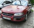 Червоний Опель Омега, об'ємом двигуна 2.5 л та пробігом 140 тис. км за 1800 $, фото 1 на Automoto.ua