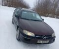 Красный Опель Омега, объемом двигателя 2 л и пробегом 310 тыс. км за 1300 $, фото 4 на Automoto.ua