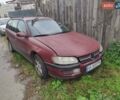 Красный Опель Омега, объемом двигателя 2 л и пробегом 300 тыс. км за 1800 $, фото 1 на Automoto.ua