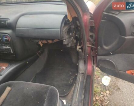 Красный Опель Омега, объемом двигателя 2 л и пробегом 300 тыс. км за 1800 $, фото 9 на Automoto.ua