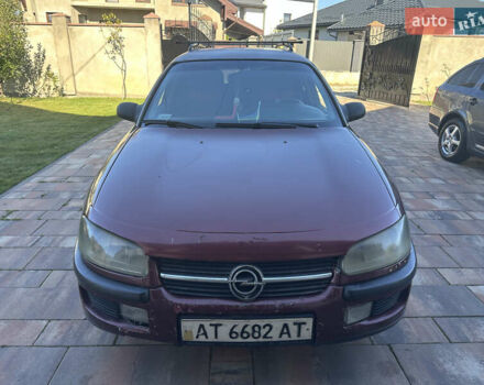Красный Опель Омега, объемом двигателя 2 л и пробегом 310 тыс. км за 1200 $, фото 1 на Automoto.ua