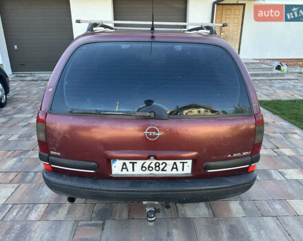 Красный Опель Омега, объемом двигателя 2 л и пробегом 310 тыс. км за 1200 $, фото 3 на Automoto.ua