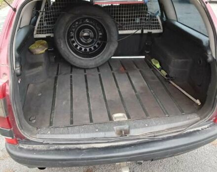 Красный Опель Омега, объемом двигателя 2 л и пробегом 317 тыс. км за 1450 $, фото 26 на Automoto.ua