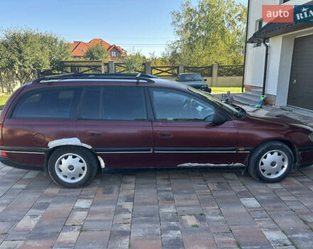 Красный Опель Омега, объемом двигателя 2 л и пробегом 310 тыс. км за 1200 $, фото 2 на Automoto.ua