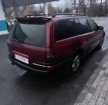 Червоний Опель Омега, об'ємом двигуна 2 л та пробігом 450 тис. км за 1500 $, фото 4 на Automoto.ua