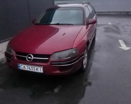 Червоний Опель Омега, об'ємом двигуна 2 л та пробігом 350 тис. км за 1500 $, фото 1 на Automoto.ua