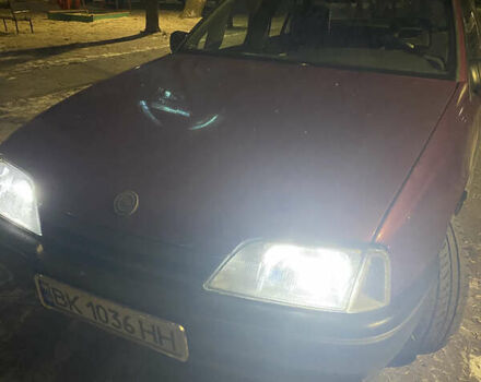 Красный Опель Омега, объемом двигателя 2 л и пробегом 400 тыс. км за 1450 $, фото 1 на Automoto.ua