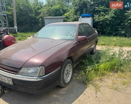 Красный Опель Омега, объемом двигателя 2.41 л и пробегом 400 тыс. км за 650 $, фото 1 на Automoto.ua