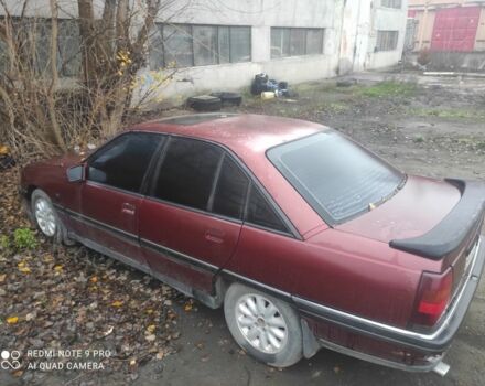 Красный Опель Омега, объемом двигателя 2.6 л и пробегом 320 тыс. км за 1000 $, фото 1 на Automoto.ua