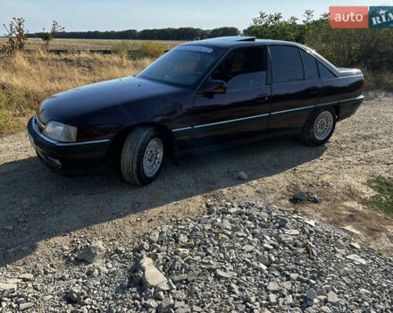 Красный Опель Омега, объемом двигателя 2.6 л и пробегом 200 тыс. км за 2300 $, фото 1 на Automoto.ua