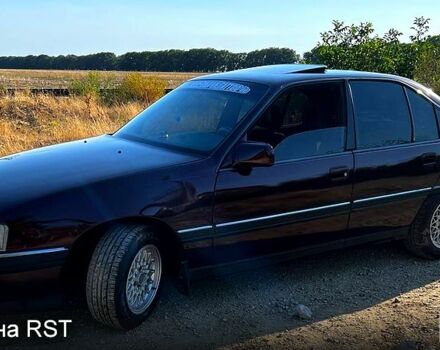 Красный Опель Омега, объемом двигателя 2.6 л и пробегом 285 тыс. км за 1950 $, фото 1 на Automoto.ua