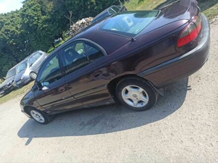 Красный Опель Омега, объемом двигателя 2 л и пробегом 534 тыс. км за 1200 $, фото 1 на Automoto.ua