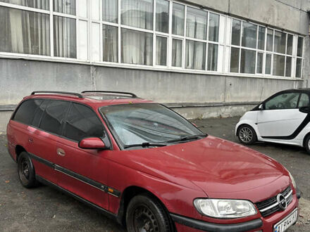 Красный Опель Омега, объемом двигателя 2 л и пробегом 401 тыс. км за 950 $, фото 1 на Automoto.ua