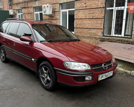 Червоний Опель Омега, об'ємом двигуна 2 л та пробігом 321 тис. км за 4200 $, фото 1 на Automoto.ua