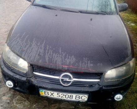 Красный Опель Омега, объемом двигателя 2 л и пробегом 300 тыс. км за 1000 $, фото 1 на Automoto.ua