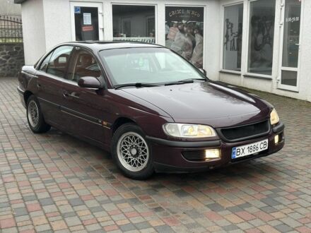 Червоний Опель Омега, об'ємом двигуна 2 л та пробігом 301 тис. км за 2200 $, фото 1 на Automoto.ua