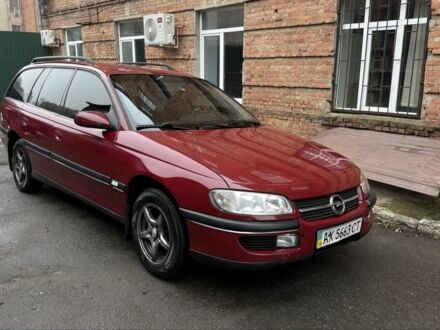 Червоний Опель Омега, об'ємом двигуна 2 л та пробігом 331 тис. км за 3000 $, фото 1 на Automoto.ua