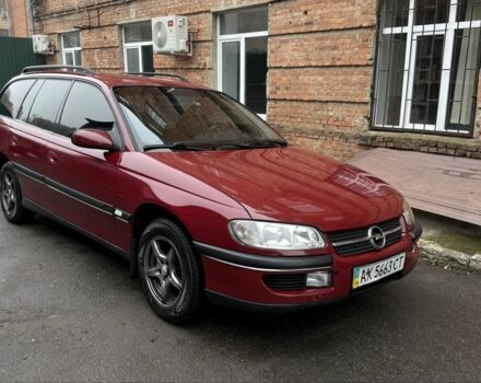 Червоний Опель Омега, об'ємом двигуна 2 л та пробігом 331 тис. км за 3000 $, фото 1 на Automoto.ua
