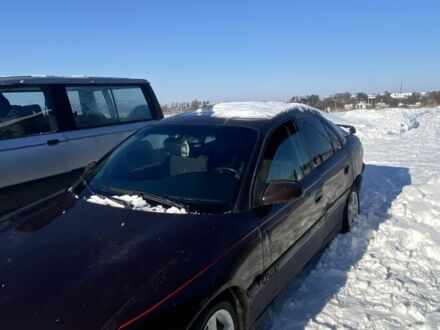 Червоний Опель Омега, об'ємом двигуна 2.5 л та пробігом 300 тис. км за 600 $, фото 1 на Automoto.ua