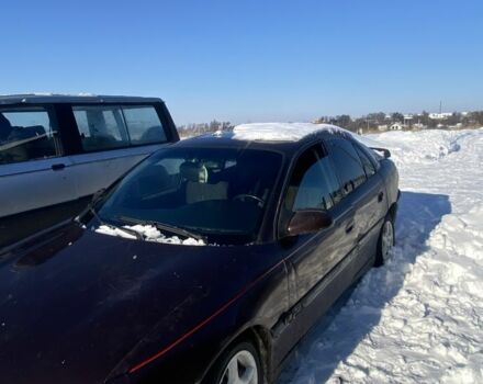 Красный Опель Омега, объемом двигателя 2.5 л и пробегом 300 тыс. км за 600 $, фото 1 на Automoto.ua