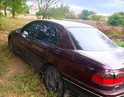 Червоний Опель Омега, об'ємом двигуна 3 л та пробігом 300 тис. км за 1100 $, фото 1 на Automoto.ua