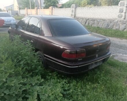 Красный Опель Омега, объемом двигателя 0 л и пробегом 200 тыс. км за 990 $, фото 1 на Automoto.ua