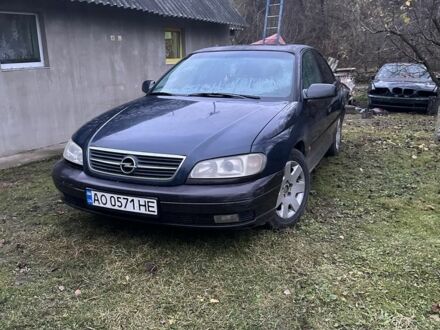 Красный Опель Омега, объемом двигателя 2 л и пробегом 330 тыс. км за 1900 $, фото 1 на Automoto.ua