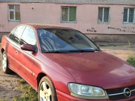 Червоний Опель Омега, об'ємом двигуна 3 л та пробігом 294 тис. км за 2400 $, фото 1 на Automoto.ua