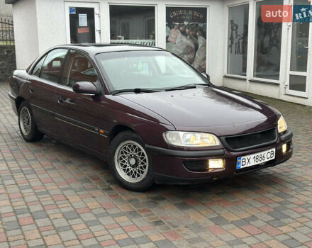 Червоний Опель Омега, об'ємом двигуна 2 л та пробігом 301 тис. км за 2200 $, фото 1 на Automoto.ua