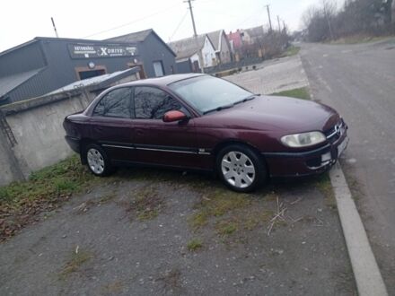 Красный Опель Омега, объемом двигателя 2 л и пробегом 65 тыс. км за 1550 $, фото 1 на Automoto.ua