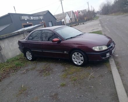 Червоний Опель Омега, об'ємом двигуна 2 л та пробігом 65 тис. км за 1550 $, фото 1 на Automoto.ua