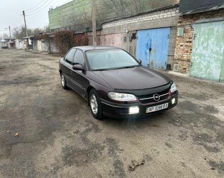 Красный Опель Омега, объемом двигателя 2.5 л и пробегом 390 тыс. км за 1800 $, фото 1 на Automoto.ua