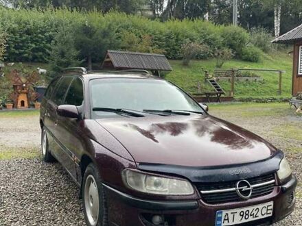 Красный Опель Омега, объемом двигателя 2 л и пробегом 250 тыс. км за 1200 $, фото 1 на Automoto.ua