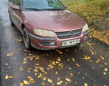 Червоний Опель Омега, об'ємом двигуна 2 л та пробігом 2 тис. км за 1300 $, фото 1 на Automoto.ua