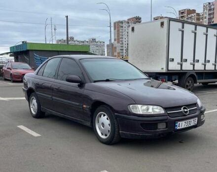 Красный Опель Омега, объемом двигателя 2 л и пробегом 280 тыс. км за 2400 $, фото 1 на Automoto.ua