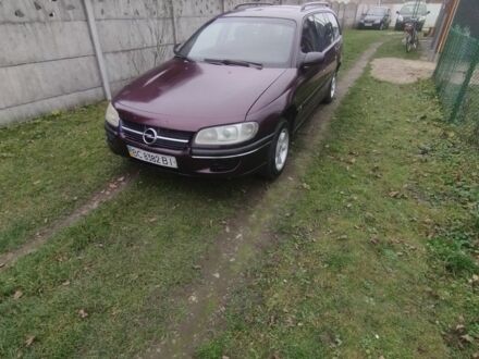Красный Опель Омега, объемом двигателя 2 л и пробегом 199 тыс. км за 1350 $, фото 1 на Automoto.ua