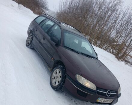 Красный Опель Омега, объемом двигателя 2 л и пробегом 310 тыс. км за 1300 $, фото 1 на Automoto.ua