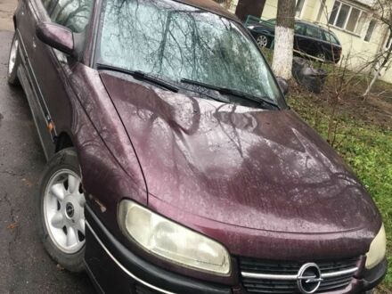 Красный Опель Омега, объемом двигателя 2 л и пробегом 260 тыс. км за 500 $, фото 1 на Automoto.ua