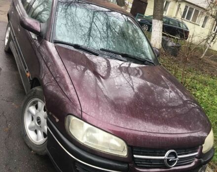 Красный Опель Омега, объемом двигателя 2 л и пробегом 260 тыс. км за 500 $, фото 1 на Automoto.ua