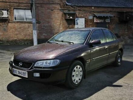 Опель Омега 1995 у Вінниці на Automoto.ua Червоний Опель Омега, об'ємом двигуна 2.5 л та пробігом 250 тис. км за 1600 $, фото 1 на Automoto.ua