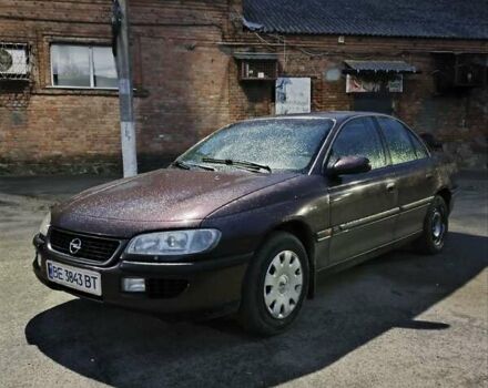 Опель Омега 1995 в Виннице на Automoto.ua Красный Опель Омега, объемом двигателя 2.5 л и пробегом 250 тыс. км за 1600 $, фото 1 на Automoto.ua