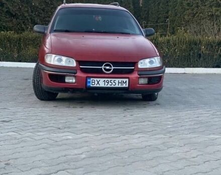 Красный Опель Омега, объемом двигателя 2.5 л и пробегом 300 тыс. км за 1600 $, фото 1 на Automoto.ua