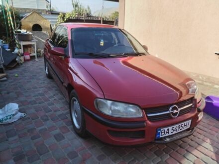Червоний Опель Омега, об'ємом двигуна 2 л та пробігом 250 тис. км за 2400 $, фото 1 на Automoto.ua