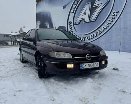Червоний Опель Омега, об'ємом двигуна 2 л та пробігом 321 тис. км за 1999 $, фото 1 на Automoto.ua